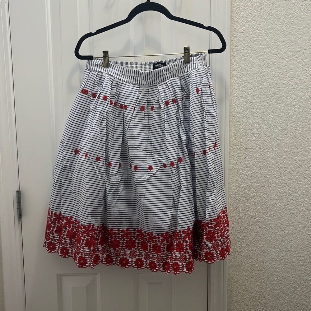 Full glue and white striped skirt with red embroidered flowers